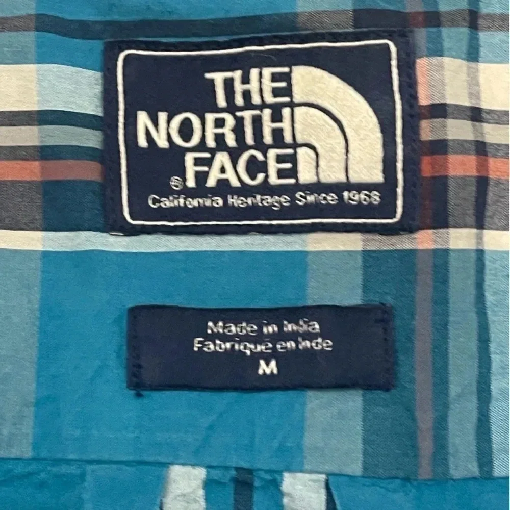 Men’s The North Face 100% cotton flannel blue plaid shirt. Size Medium. EUC.